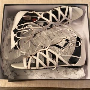 Kendall and Kylie white leather sandals.